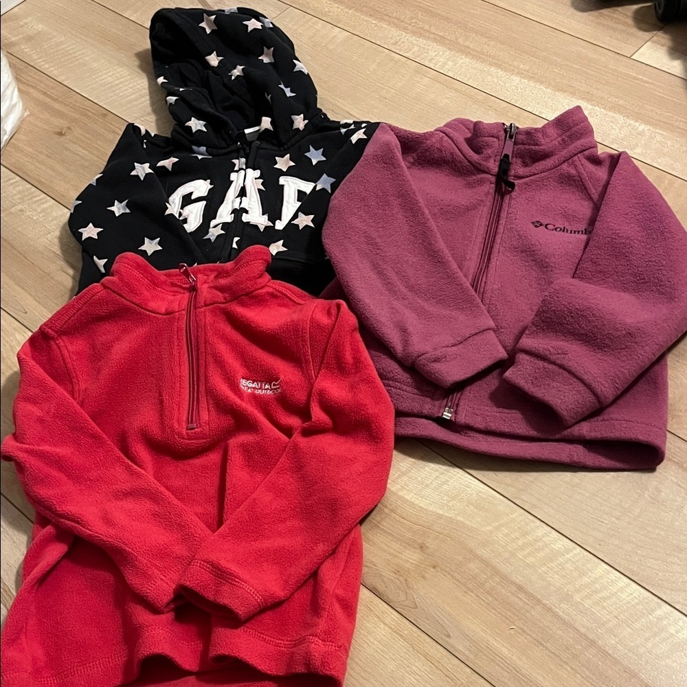 Girls sweaters in play condition.